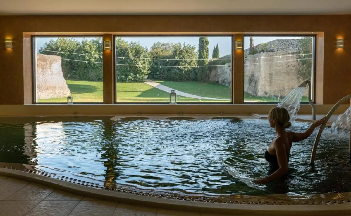 Take in garden views from the pool
