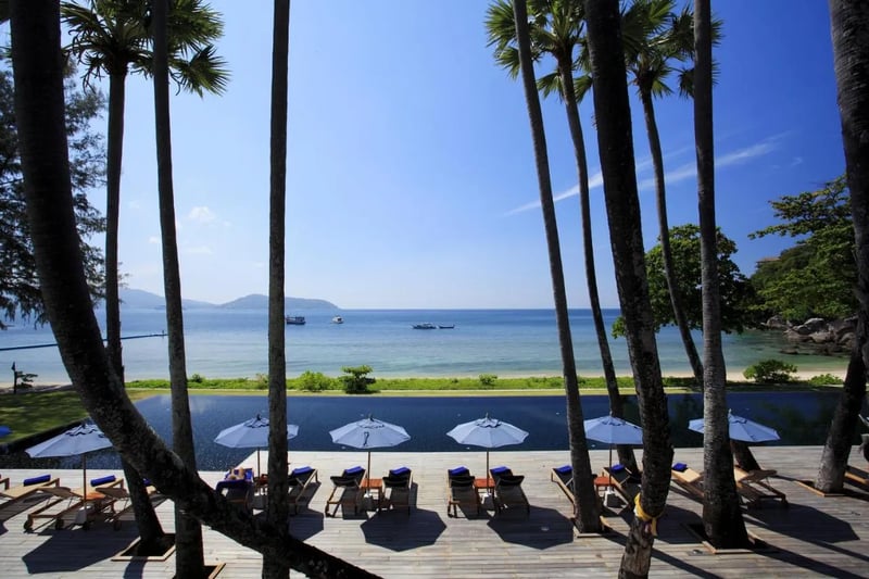 Relax at the hotel pool with a sea view