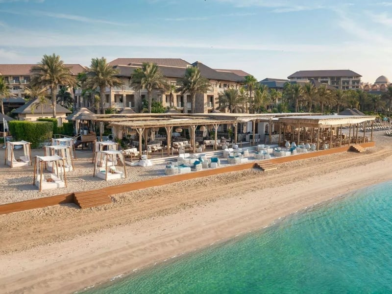 Step out straight onto the sandy beach