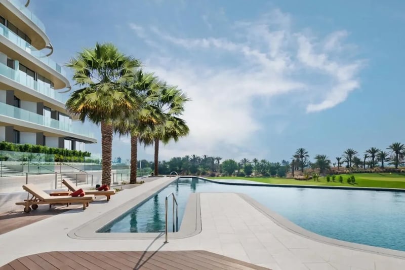Relax in the palm tree lined pools