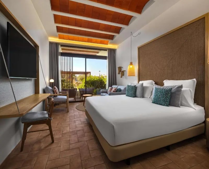 Deluxe King Room with Pool View @ Club Cala San Miguel Hotel  Curio Collection by Hilton