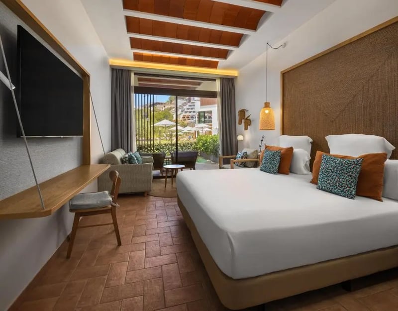 Deluxe King Room with Sea View @ Club Cala San Miguel Hotel  Curio Collection by Hilton