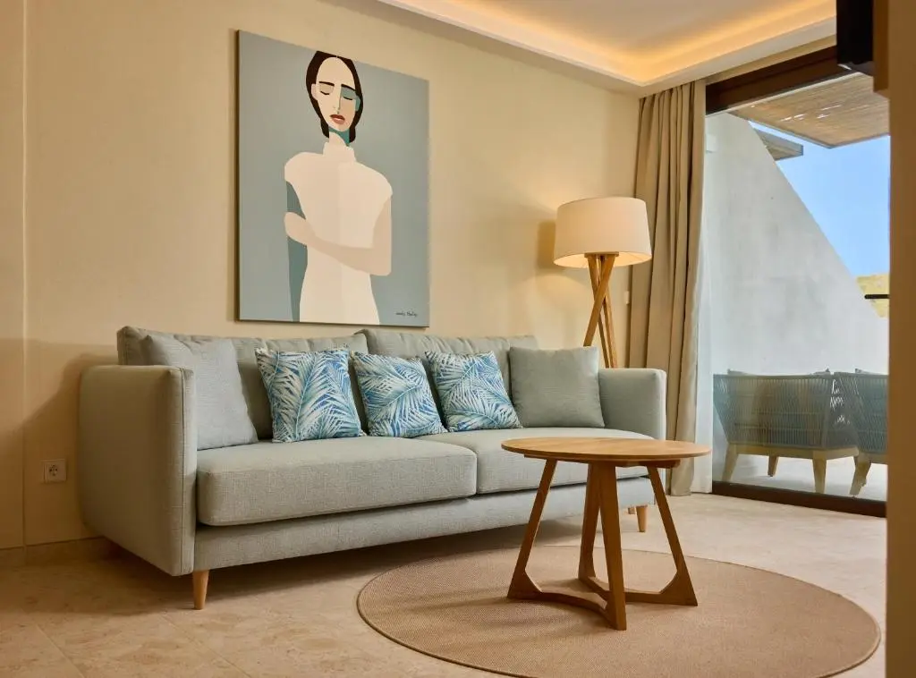 Junior King Suite with Sea View @ Cala San Miguel Hotel  Curio Collection by Hilton