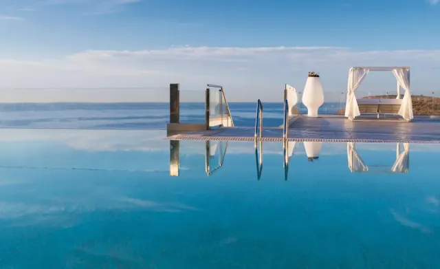 Outdoor pool with Med Sea views