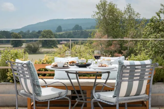 Enjoy a meal and glass of wine with a view