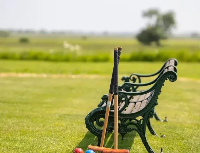 Play a round of boules or croquet