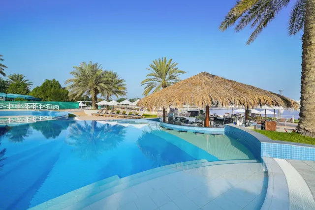 Enjoy poolside cocktails   light bites