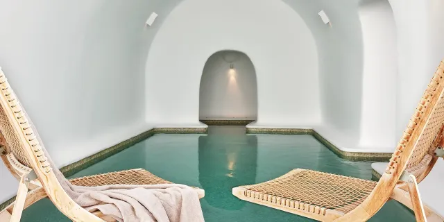 Float in the heated spa cave pool
