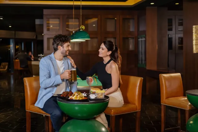 Catch a game over drinks at the bar