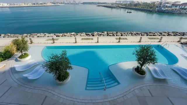 Enjoy a refreshing dip overlooking the sea