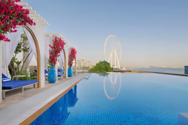 Take a refreshing dip overlooking Ain Dubai