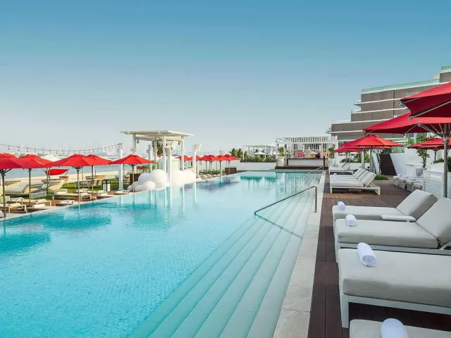 Enjoy a swim in two infinity pools