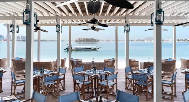 Enjoy a delicious meal overlooking the sea