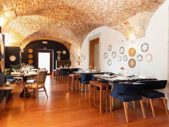 Enjoy a meal indoors or on the terrace