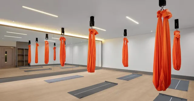 With aerial yoga  Pilates  cycling   more