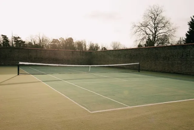 Play a friendly game of tennis