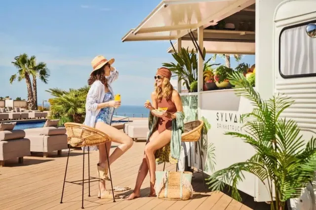 Unwind with a fresh cocktail by the pool
