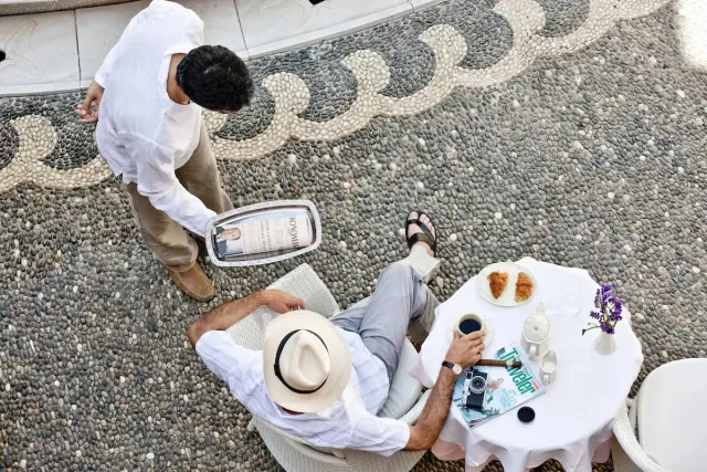 Tuck into breakfast by the pool