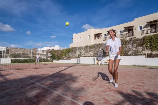 Play a friendly game on 2 clay courts