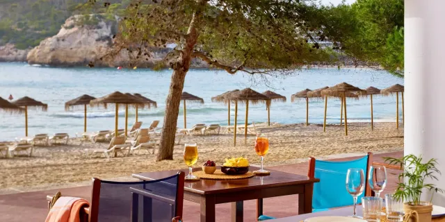 Relax with a refreshing cocktail by the water