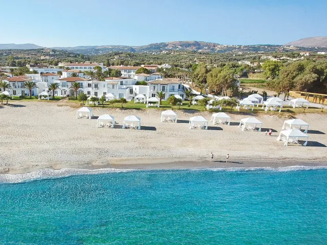 Relax on a plush sunbed by the sea