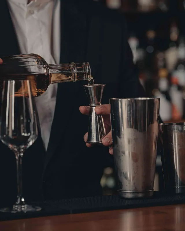 Enjoy a dram or signature cocktail at the bar