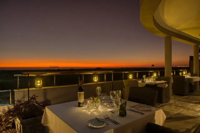 Enjoy a delicious dinner at sunset
