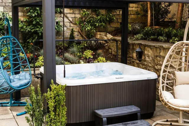 Relax in the al fresco hot tub on site