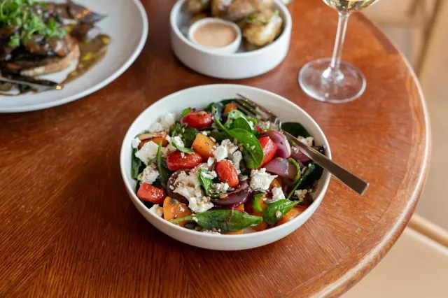 With seasonal  locally sourced ingredients