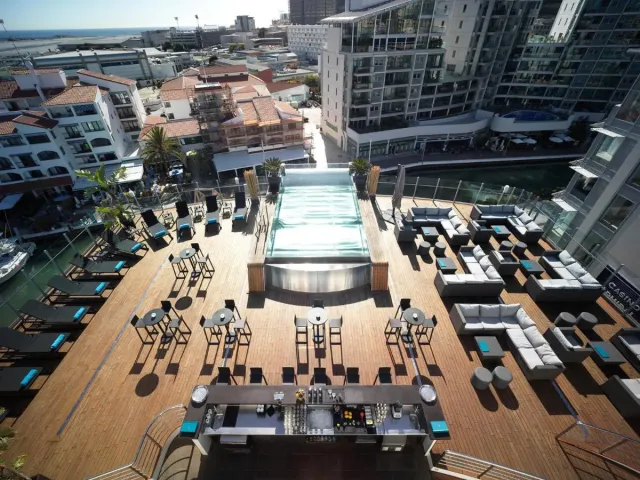 Enjoy a poolside cocktail   breathtaking views