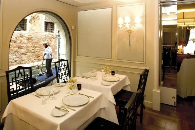 Enjoy delicious Venetian dishes and canal views