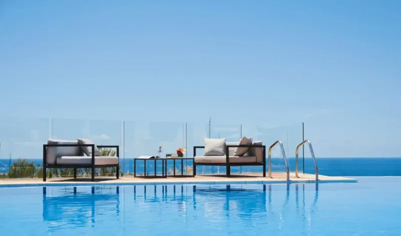 Enjoy sea views from the poolside