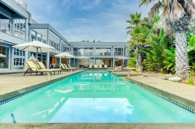 Bask in the sunshine from the poolside