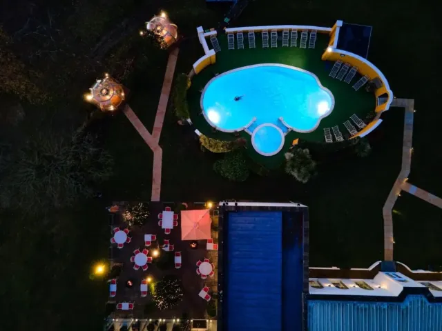 Relax in the outdoor swimming pool