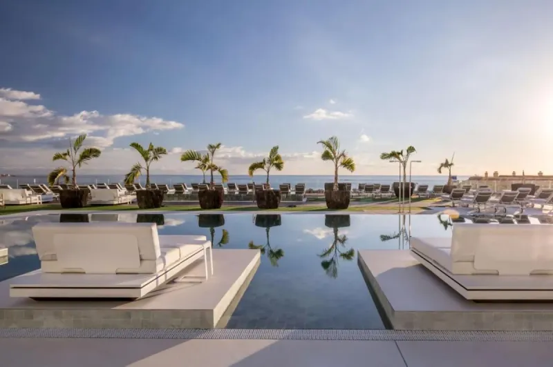 Relax with beach views from the pool