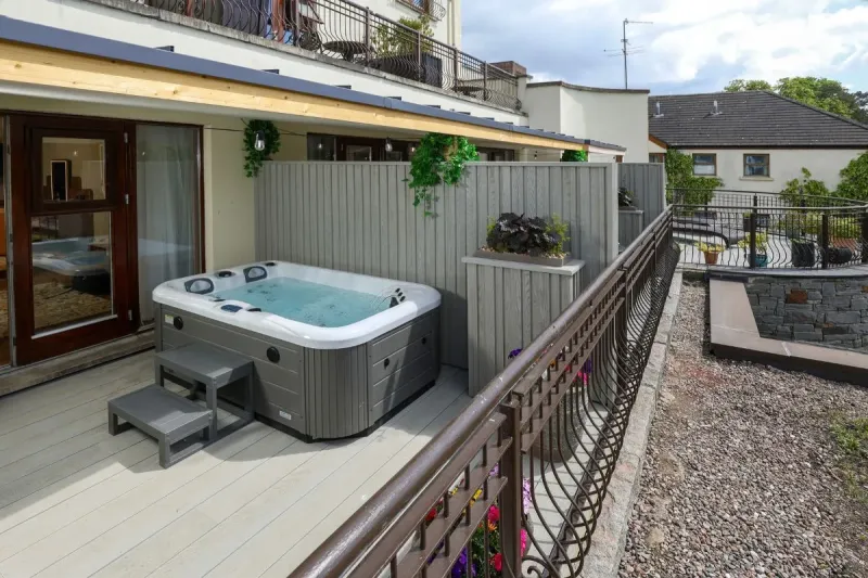 Junior Suite with Hot Tub   1 Super King Bed @ Galgorm Resort