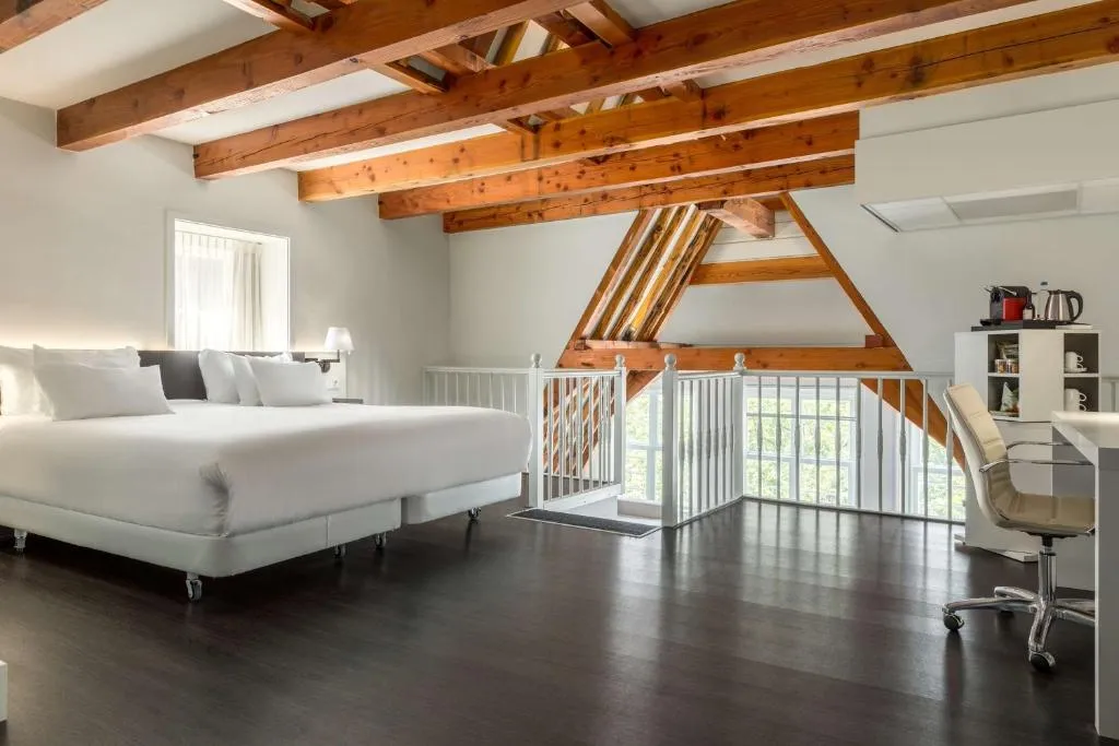 Junior Suite with Extra Bed  2 Adults   2 Children  @ NH Collection Amsterdam Barbizon Palace