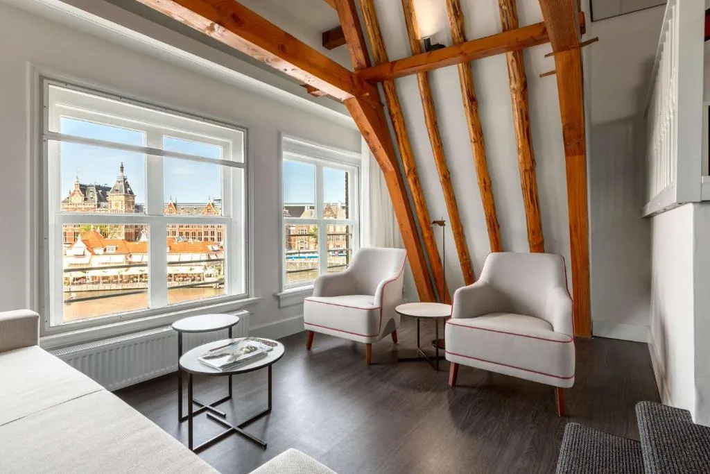 Junior Suite with Extra Bed  2 Adults   2 Children  @ NH Collection Amsterdam Barbizon Palace