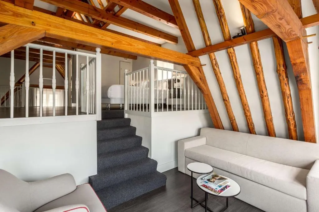 Junior Suite with Extra Bed  2 Adults   2 Children  @ NH Collection Amsterdam Barbizon Palace