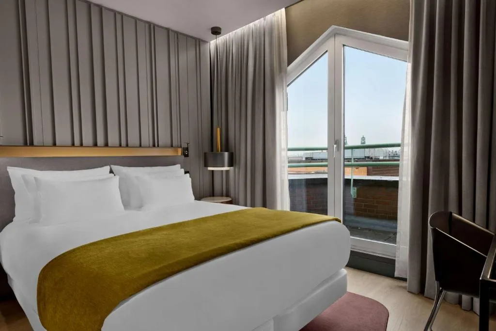 Superior Room with View and Balcony @ NH Collection Amsterdam Flower Market